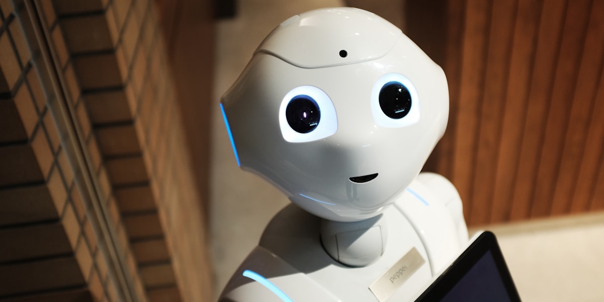 A friendly white humanoid robot
