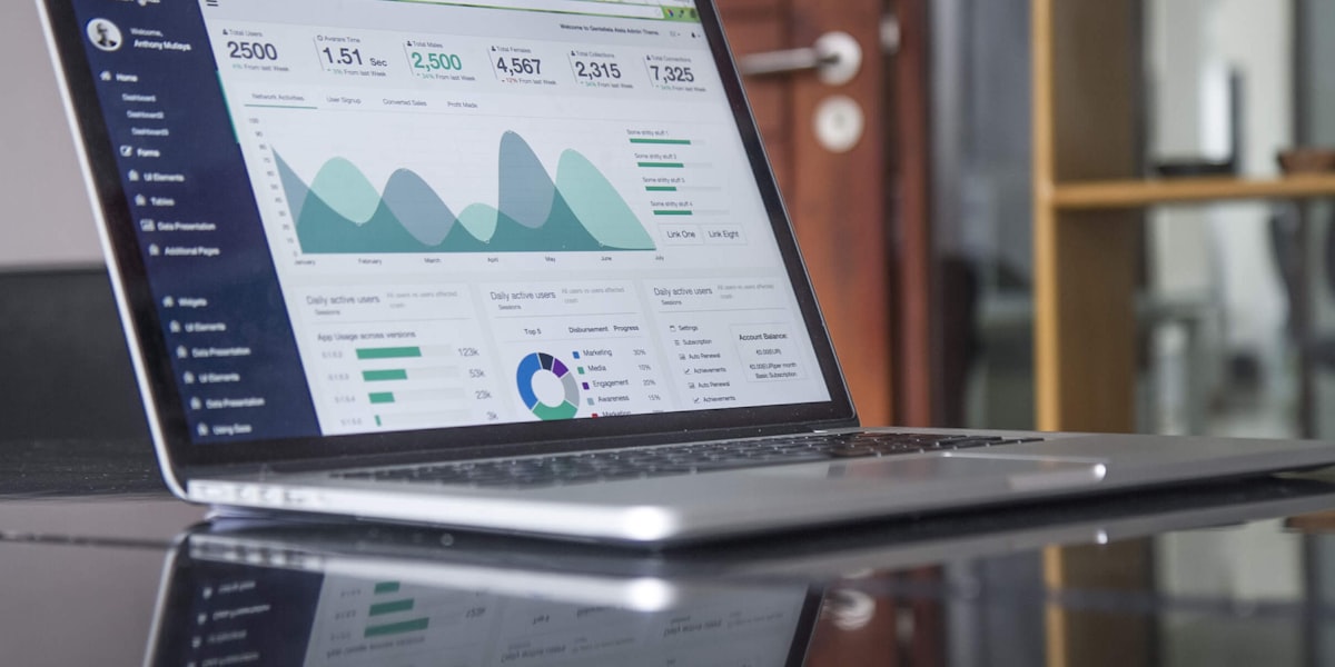 A laptop displaying an analytics dashboard